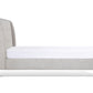 Upholstered Bed in gray color with buttoned headboard side view